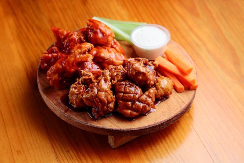 Buffalo Wings - classic east coast wings tossed in tangy buffalo sauce