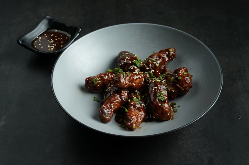 BBQ Smoky Wings slow-smoked and coated in rich BBQ sauce